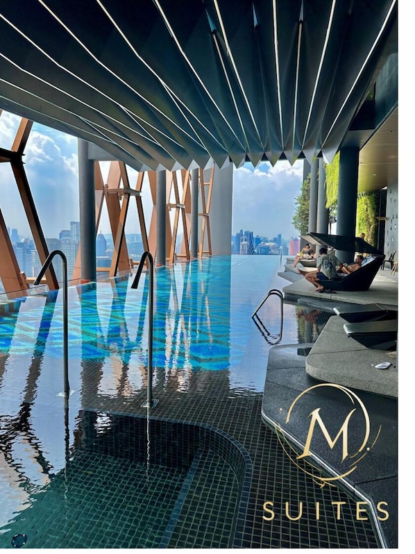 2 outdoor pools, open 10:00 AM to 10:00 PM, pool umbrellas, sun loungers