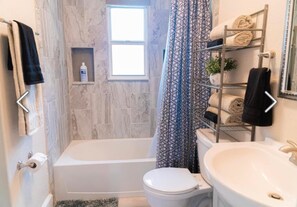 Hair dryer, towels, soap, toilet paper