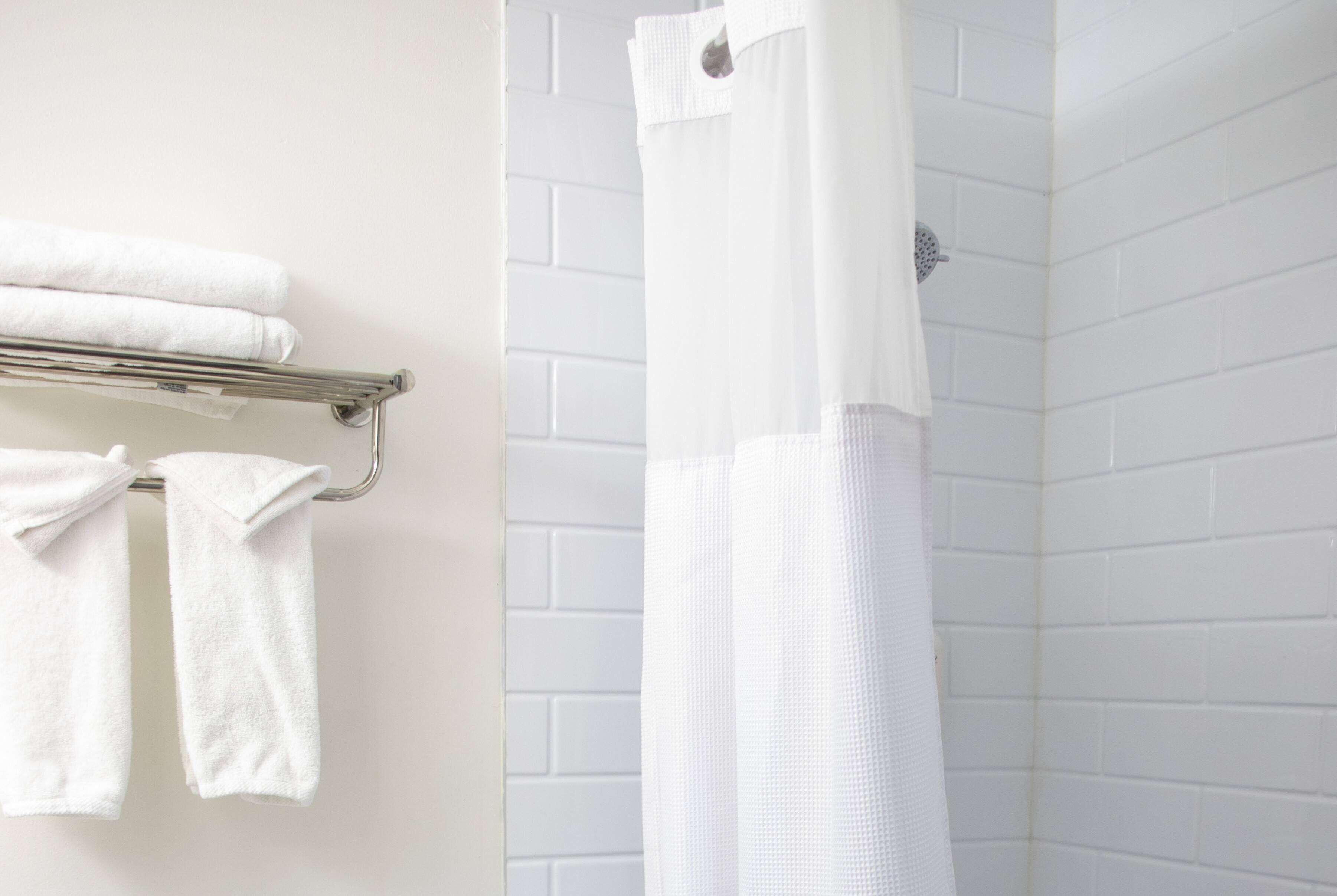 Rainfall showerhead, towels