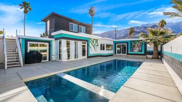 Outdoor pool, pool umbrellas, pool loungers