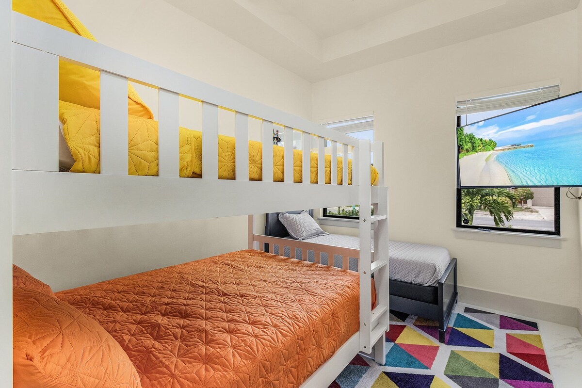 Photo 7 of Naples Vibes! Close to the 🏖️! Heated Pool&Spa, Lanai, Grill! Two Kings! Arcade!