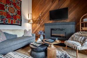 Smart TV, fireplace, books