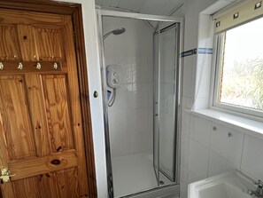 Bathtub, hair dryer, towels
