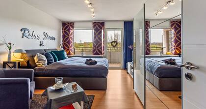 Ferienwohnung "Comfort" mit Gemeinschaftsgarten, Balkon und WLAN