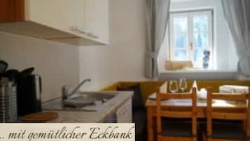 Fridge, stovetop, dishwasher, coffee/tea maker