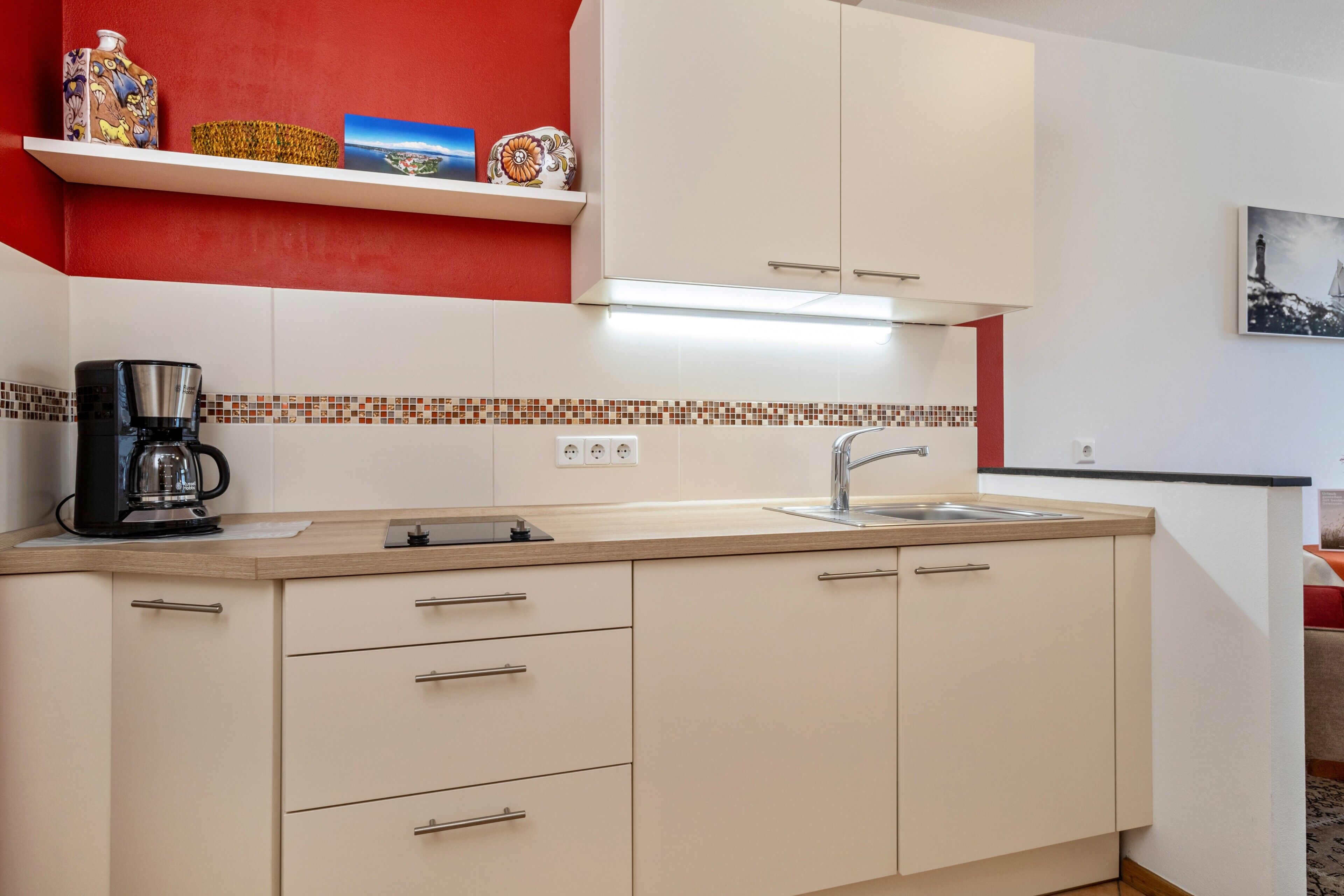 Fridge, stovetop, coffee/tea maker, electric kettle