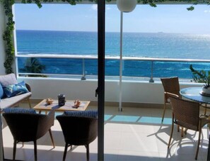 Outdoor dining - Amazing Views Ocean Front Condo! (Juan Dolio)