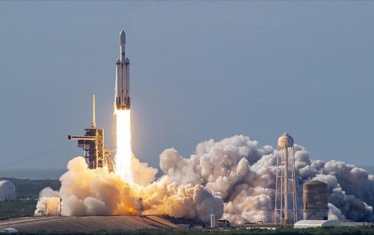 A rocket launch with smoke and flames.