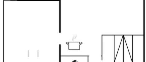 A floor plan with a kitchen, a living area, and a bathroom.