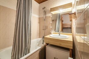 Bathtub, hair dryer