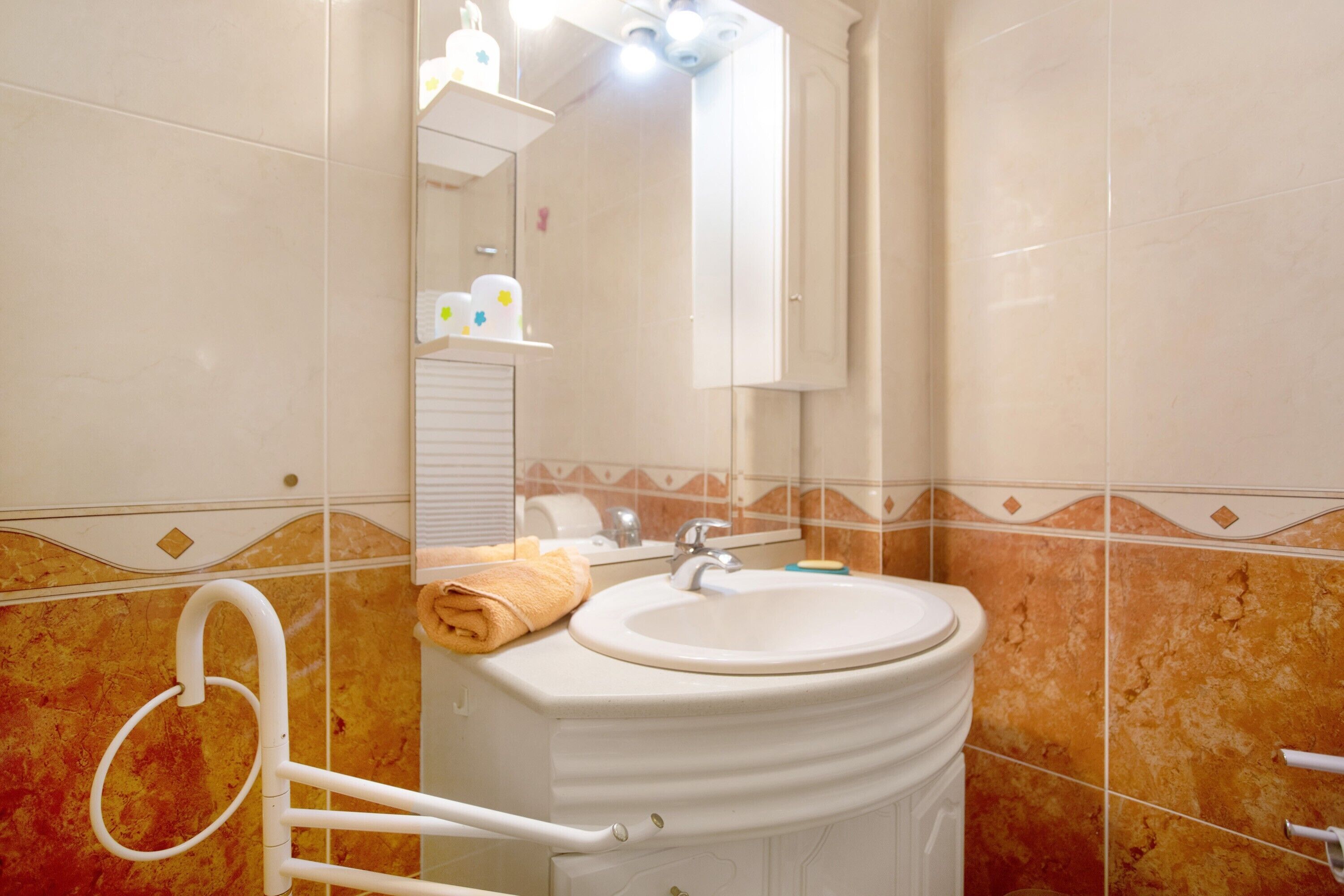 Bathtub, hair dryer, towels