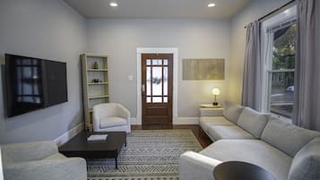 House (2 Bedrooms) | Living area | 50-inch TV with digital channels
