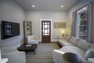 House (2 Bedrooms) | Living area | 50-inch TV with digital channels