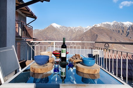 Outdoor dining. Holiday Home "Baita Margherita" with Mountain View & Private Terrace