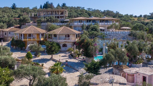 A hillside property with multiple buildings, a swimming pool, and a well-maintained garden. - Studio Apartment 'Paco's Resort Standard  4' with Mountain View, Wi-Fi and Air Conditioning (Paxoi)