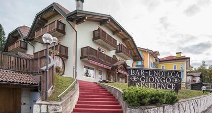 Appartement 'Giongo Residence Aparthotel 101' avec vue sur la montagne, terrasse partagée et Wi-Fi