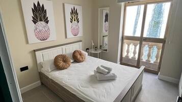 3 habitaciones, tabla de planchar con plancha, wifi y ropa de cama