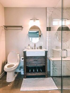Shower, eco-friendly toiletries, hair dryer, towels