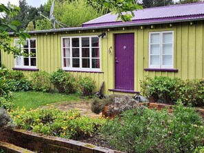 Exterior detail - Cosy and private cottage with crashing waves and bird song to soothe your soul. (Leithfield)