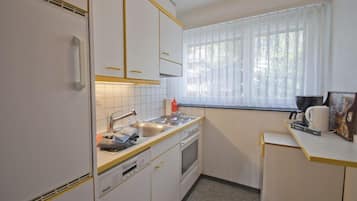 Apartamento conforto | Cozinha privada | Geladeira, fogão, cooktop, lava-louças