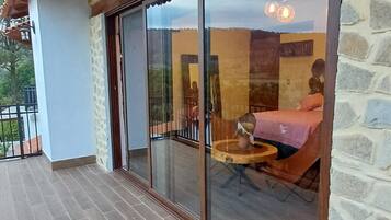 Habitación Deluxe con 2 camas individuales, chimenea, vista a la montaña | Vista a la montaña