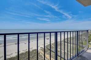 A balcony with a view of the beach and ocean. - Pool Access: 8th-floor Condo on North Myrtle Beach (North Myrtle Beach)