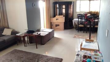 Shared Dormitory, 1 Bedroom, Balcony, City View | Living area