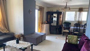 Shared Dormitory, 1 Bedroom, Balcony, City View | Living area - Females Only Host is Woman Citycenter (Alexandria)