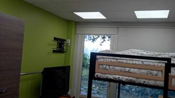 1 chambre, fer et planche Ă repasser, Wi-Fi, draps fournis