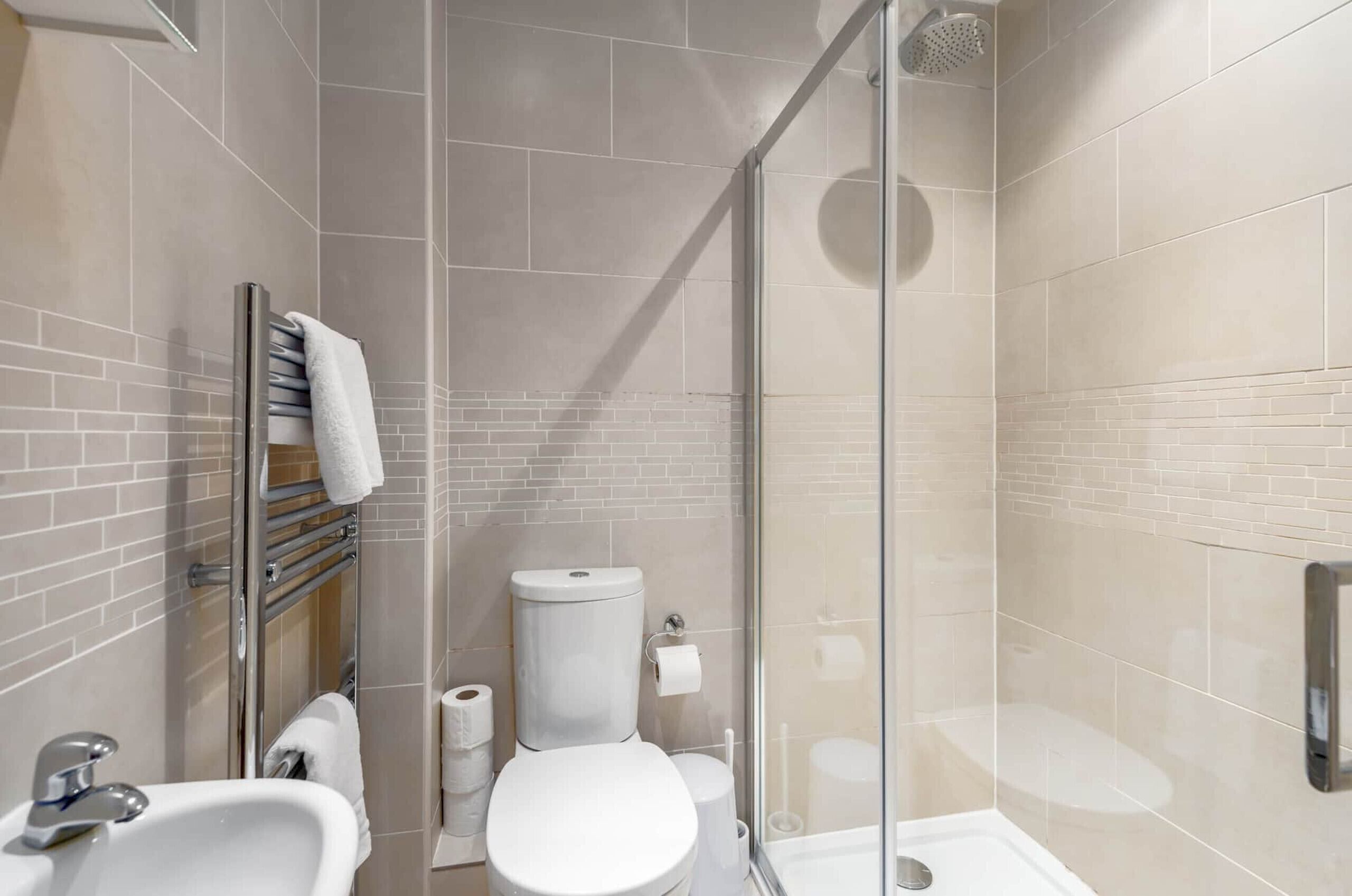 Bathtub, hair dryer, towels, soap