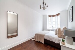 3 dormitorios, tabla de planchar con plancha, wifi gratis y ropa de cama