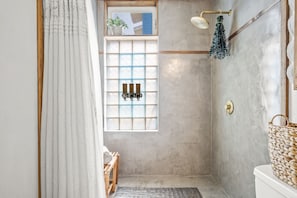 Shower, towels, soap, shampoo