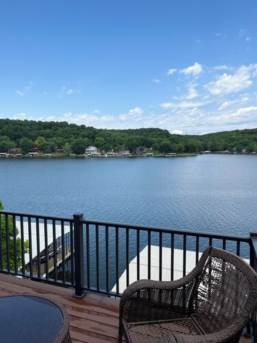 Lake house with three decks private dock and swim platform.