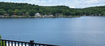 Lake house with three decks private dock and swim platform.
