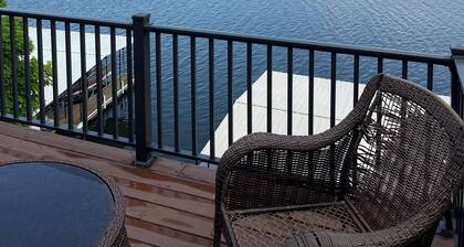 Lake house with three decks private dock and swim platform.