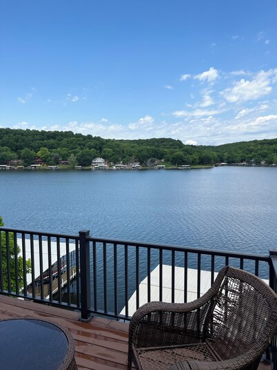 Lake house with three decks private dock and swim platform.