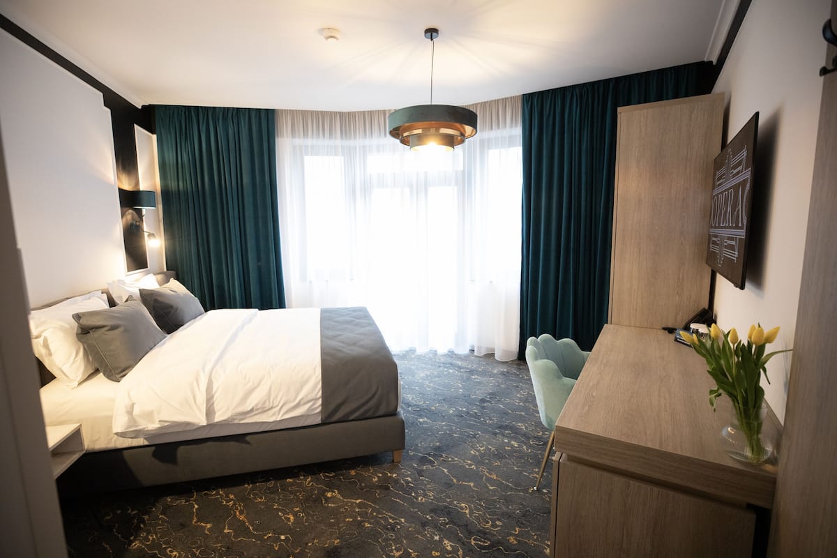 Deluxe Room, 1 Queen Bed | 1 bedroom, memory foam beds, minibar, in-room safe