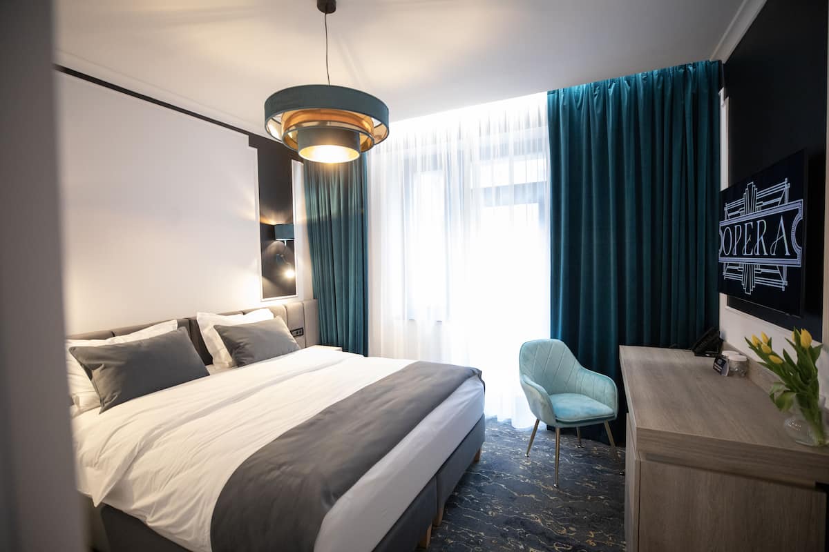 Căn hộ Deluxe | Nệm cao su hoạt tính (memory foam), minibar, két bảo mật tại phòng, bàn 
