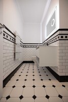 Double Deluxe with Extendable Chair | Bathroom | Rainfall showerhead, free toiletries, hair dryer, slippers