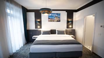 Memory-foam beds, minibar, in-room safe, desk