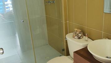 Shower, hair dryer, towels, soap