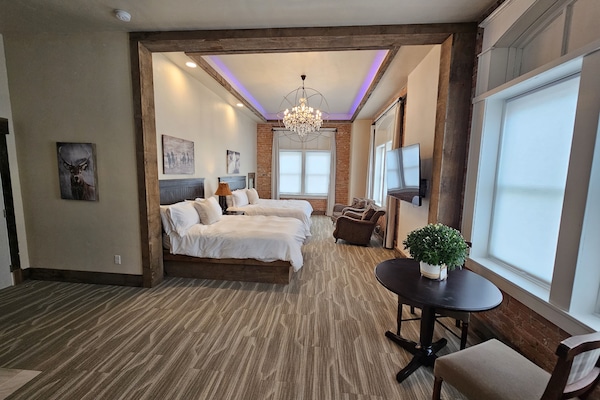 Executive-studiosviitti | Ylelliset vuodevaatteet, yksilöllisesti sisustettu