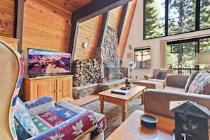 TV, fireplace, books - Carnelian Bay Cabin w/ Hot Tub, Pocket Lake Views (Carnelian Bay)
