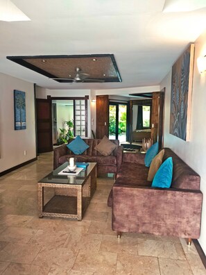 Luxury Villa, Private Pool, Beachfront | Living area | 50-inch flat-screen TV with cable channels