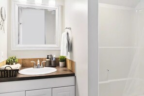 Hair dryer, towels, soap, shampoo