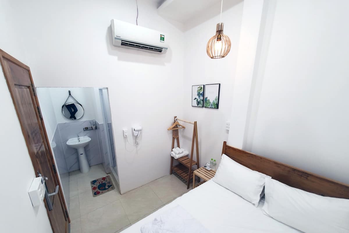 Economy Double Room | Desk, blackout drapes, iron/ironing board, free WiFi