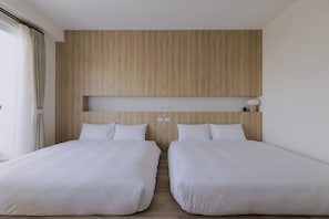 Basic Quadruple Room | Down comforters, free WiFi, bed sheets