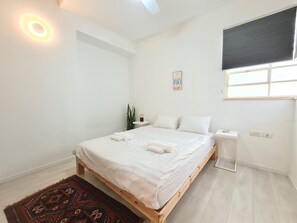 Apartment, 2 Bedrooms | 2 bedrooms, desk, iron/ironing board, free WiFi - Sderot Chen 9 - By Beach Apartments TLV (Tel Aviv)