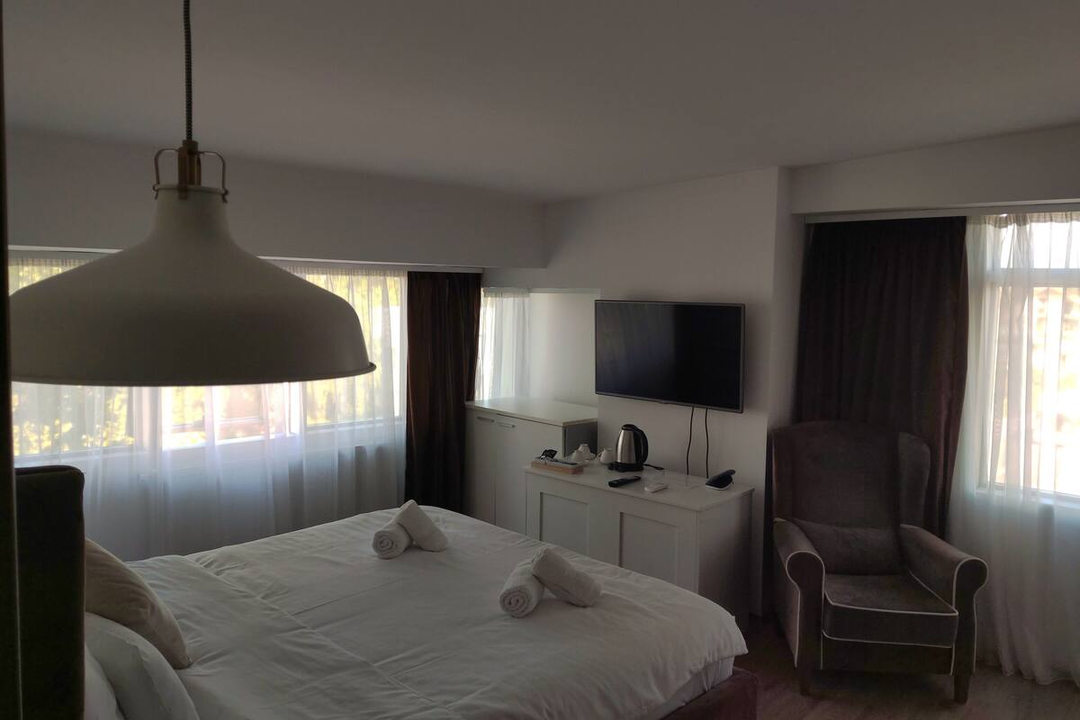 Premium bedding, memory-foam beds, desk, blackout curtains