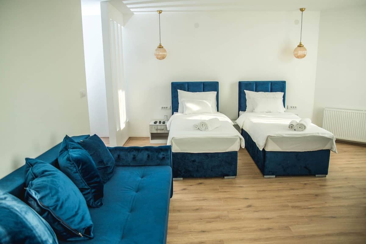 Premium bedding, memory-foam beds, desk, blackout curtains